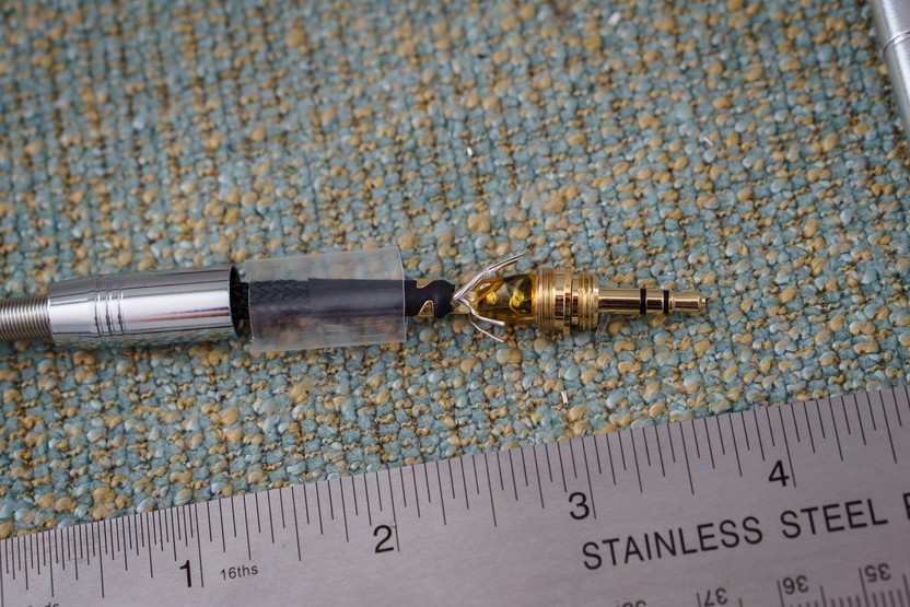 Plug with clear heatshrink and trimmed wire